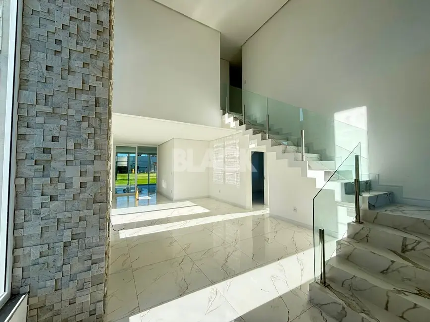 Foto 7 de Casa de Condomínio com 6 quartos à venda, 474m2 em Torres - RS