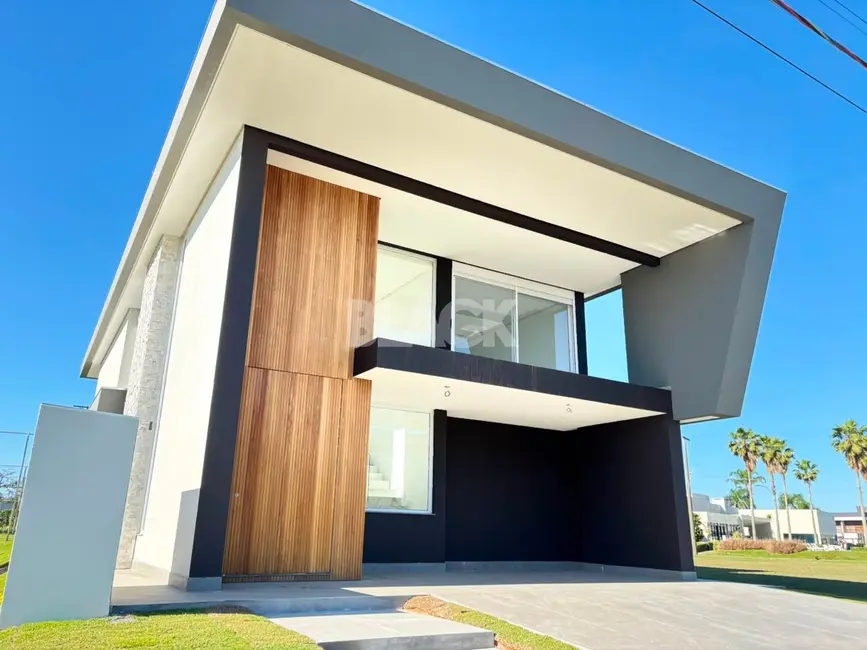 Foto 1 de Casa de Condomínio com 6 quartos à venda, 474m2 em Torres - RS