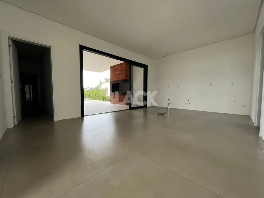 Foto 7 de Casa de Condomínio com 3 quartos à venda, 220m2 em Torres - RS