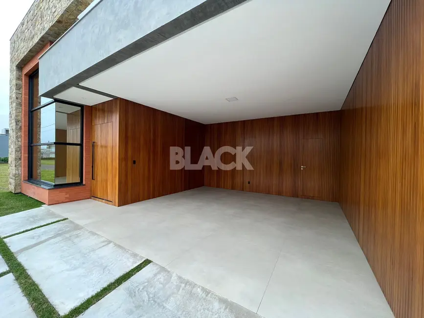 Foto 4 de Casa de Condomínio com 3 quartos à venda, 220m2 em Torres - RS