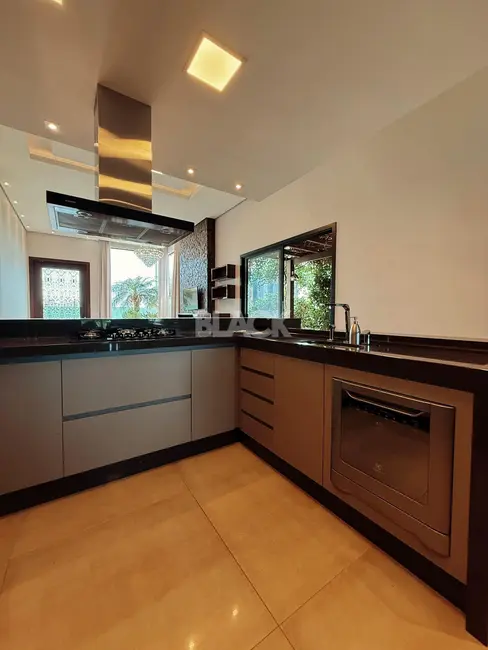 Foto 7 de Casa de Condomínio com 3 quartos à venda, 285m2 em Torres - RS