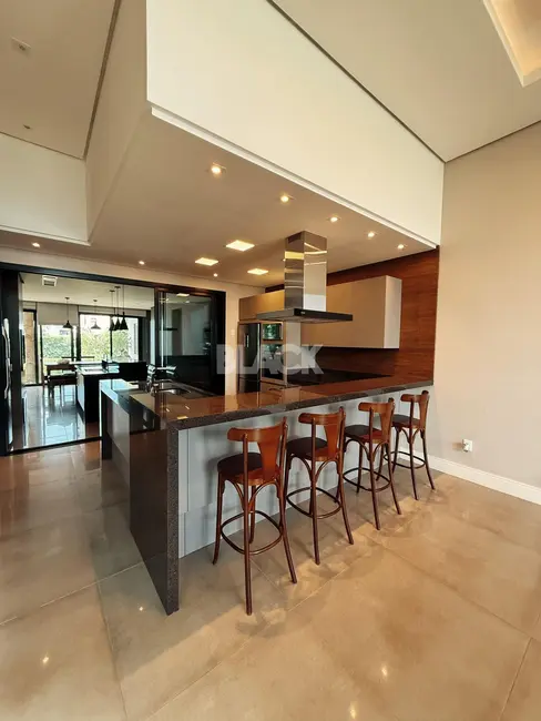 Foto 9 de Casa de Condomínio com 3 quartos à venda, 285m2 em Torres - RS