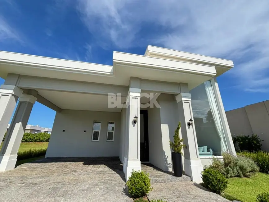 Foto 4 de Casa de Condomínio com 3 quartos à venda, 230m2 em Torres - RS