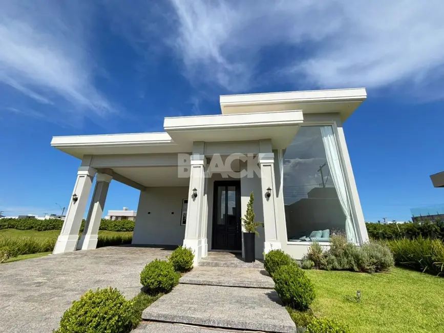 Foto 2 de Casa de Condomínio com 3 quartos à venda, 230m2 em Torres - RS