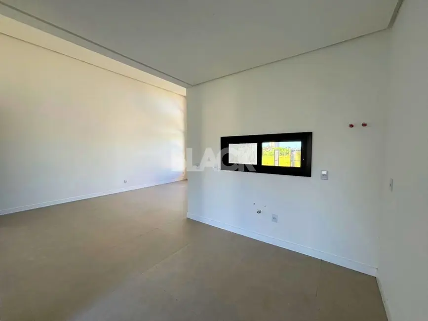 Casa com 3 quartos à venda, 110m2 em Torres - RS - imagem 8 Foto 8 de Casa com 3 quartos à venda, 110m2 em Torres - RS