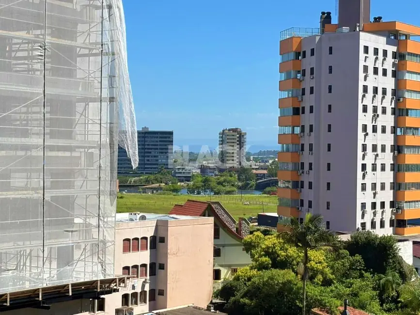 Foto 6 de Apartamento com 2 quartos à venda, 80m2 em Torres - RS