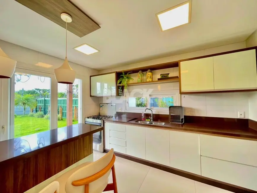 Foto 6 de Casa de Condomínio com 4 quartos à venda, 241m2 em Torres - RS