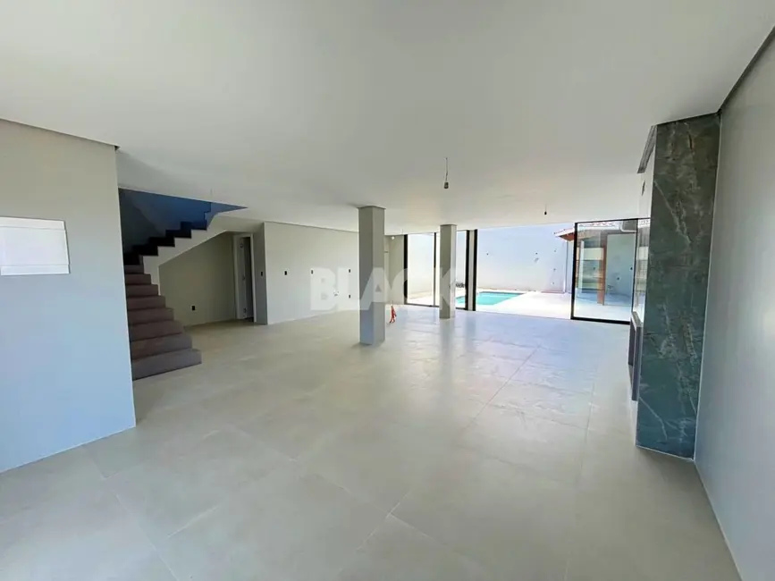 Foto 8 de Casa com 4 quartos à venda, 284m2 em Torres - RS