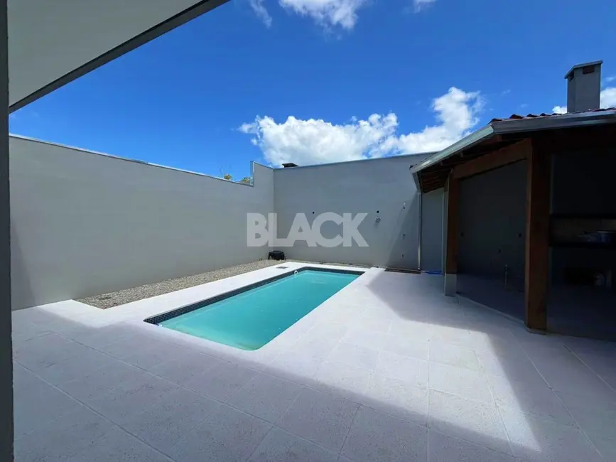 Foto 9 de Casa com 4 quartos à venda, 284m2 em Torres - RS