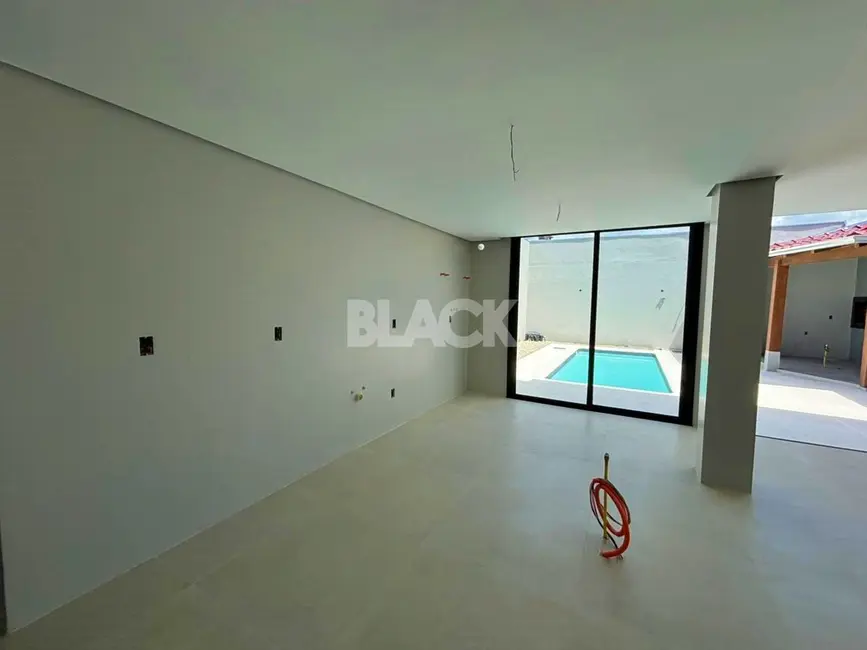 Foto 7 de Casa com 4 quartos à venda, 284m2 em Torres - RS