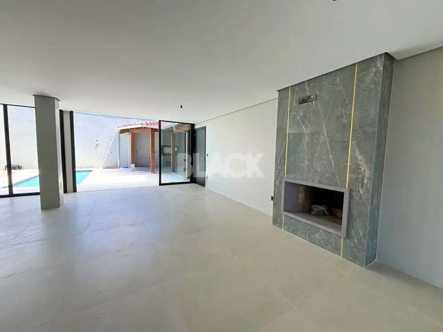 Foto 5 de Casa com 4 quartos à venda, 284m2 em Torres - RS