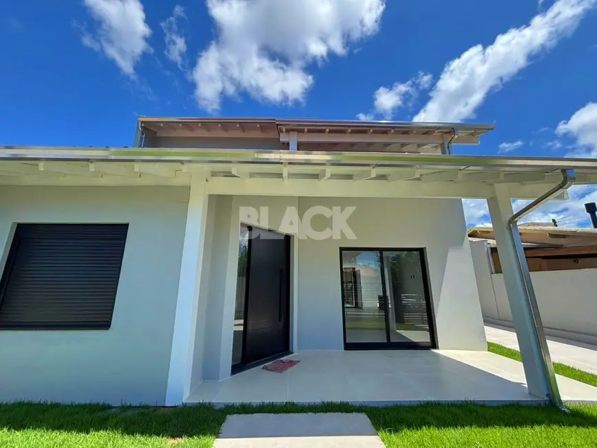 Foto 2 de Casa com 4 quartos à venda, 284m2 em Torres - RS