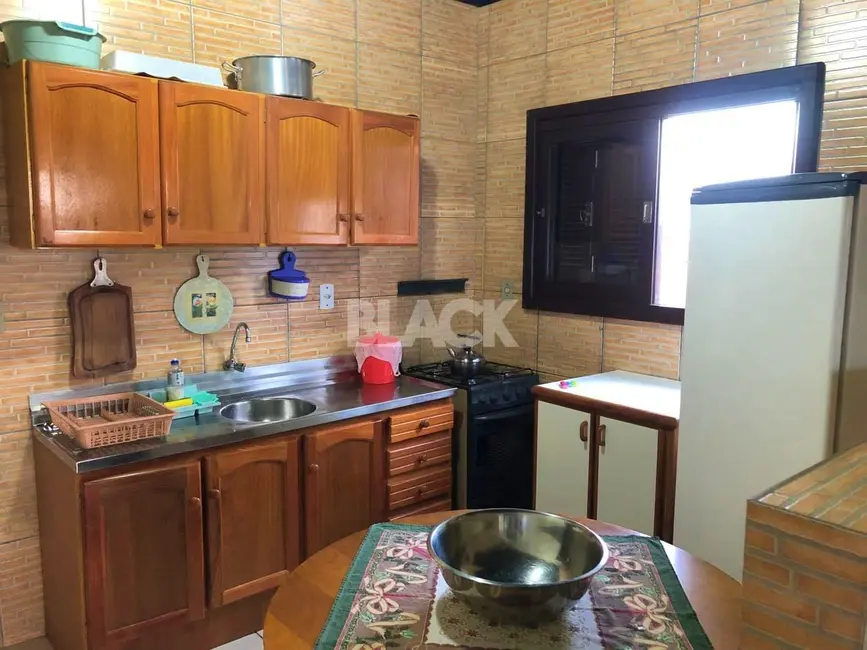 Foto 4 de Casa com 3 quartos à venda, 110m2 em Torres - RS