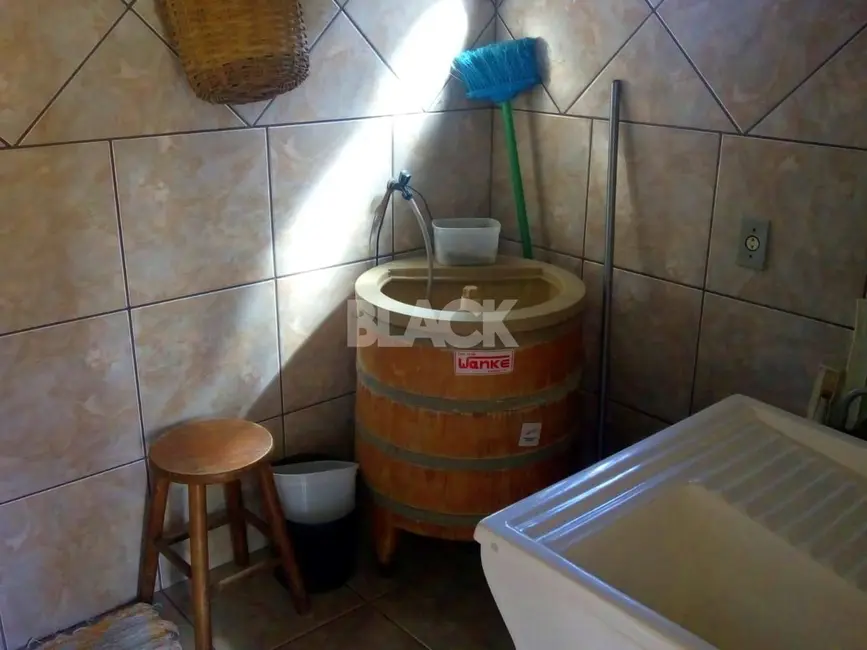 Foto 6 de Casa com 3 quartos à venda, 110m2 em Torres - RS