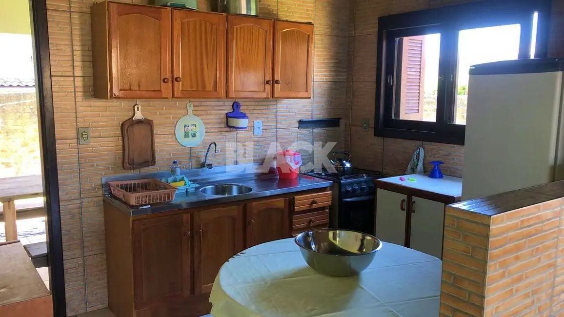 Foto 5 de Casa com 3 quartos à venda, 110m2 em Torres - RS