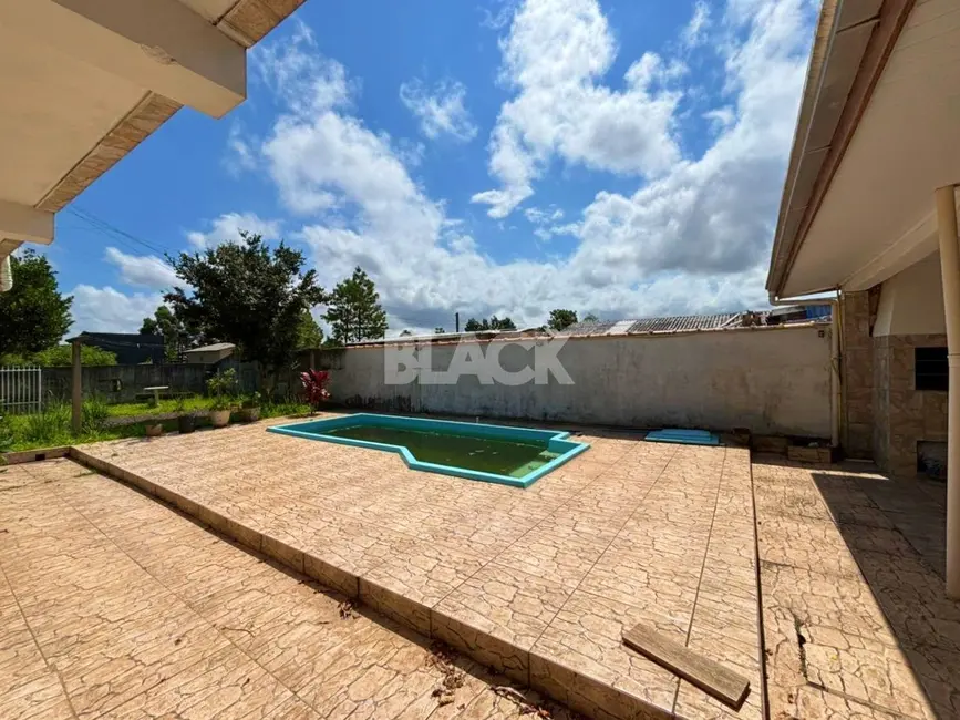 Foto 7 de Casa com 3 quartos à venda, 108m2 em Torres - RS