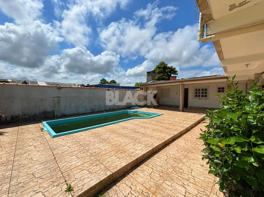 Foto 3 de Casa com 3 quartos à venda, 108m2 em Torres - RS