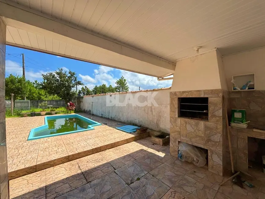 Foto 8 de Casa com 3 quartos à venda, 108m2 em Torres - RS