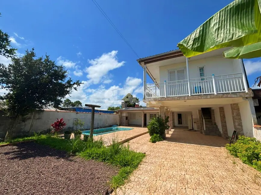 Foto 2 de Casa com 3 quartos à venda, 108m2 em Torres - RS