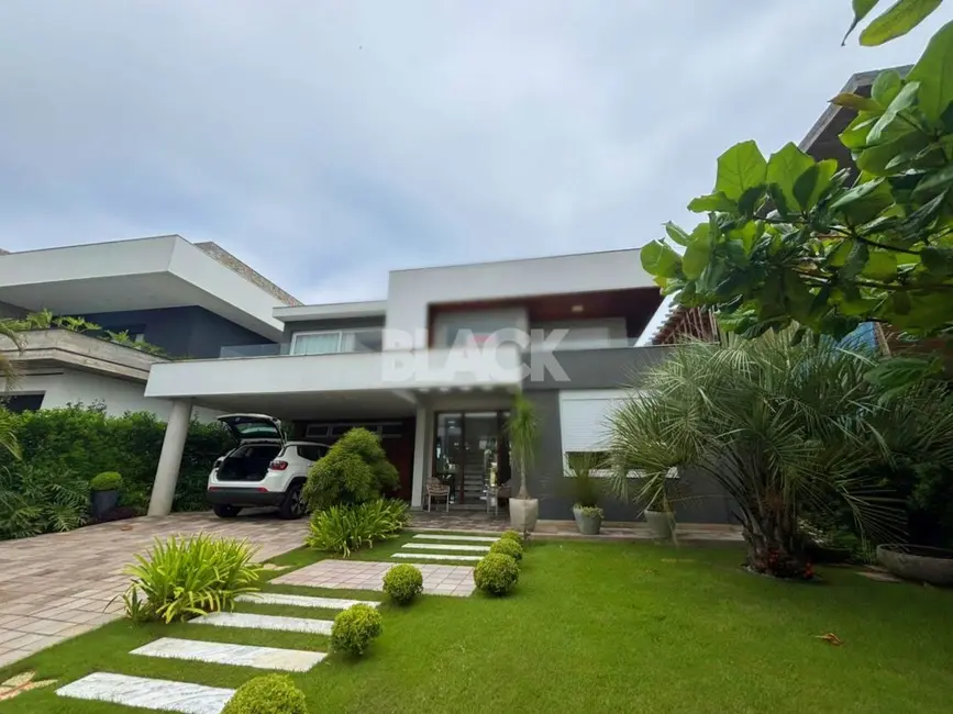 Foto 2 de Casa de Condomínio com 4 quartos à venda, 345m2 em Torres - RS