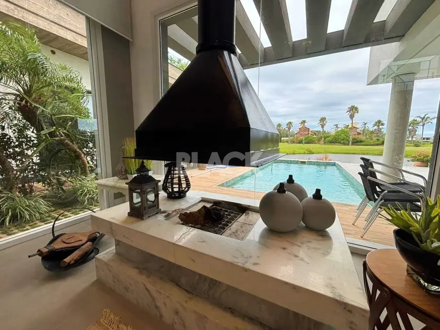 Foto 7 de Casa de Condomínio com 4 quartos à venda, 345m2 em Torres - RS