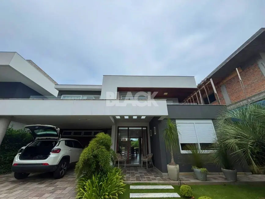 Foto 3 de Casa de Condomínio com 4 quartos à venda, 345m2 em Torres - RS