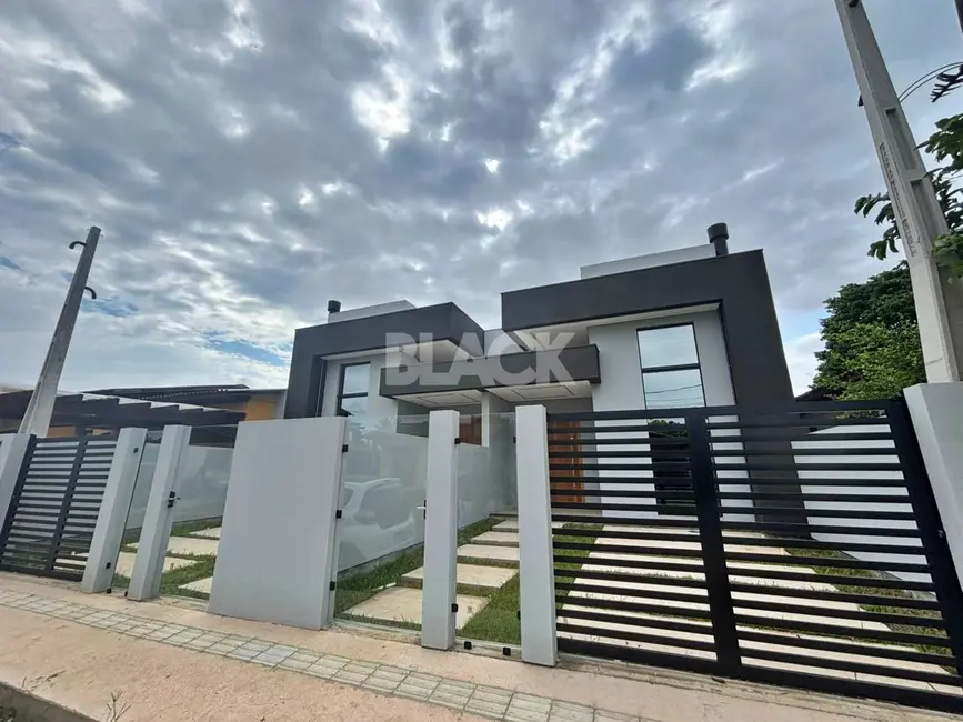 Foto 5 de Casa com 3 quartos à venda, 103m2 em Torres - RS