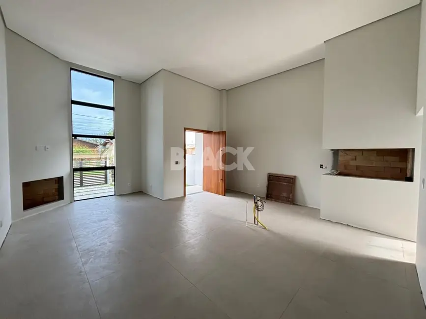 Foto 9 de Casa com 3 quartos à venda, 103m2 em Torres - RS