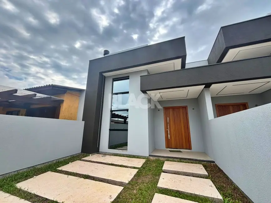 Foto 2 de Casa com 3 quartos à venda, 103m2 em Torres - RS