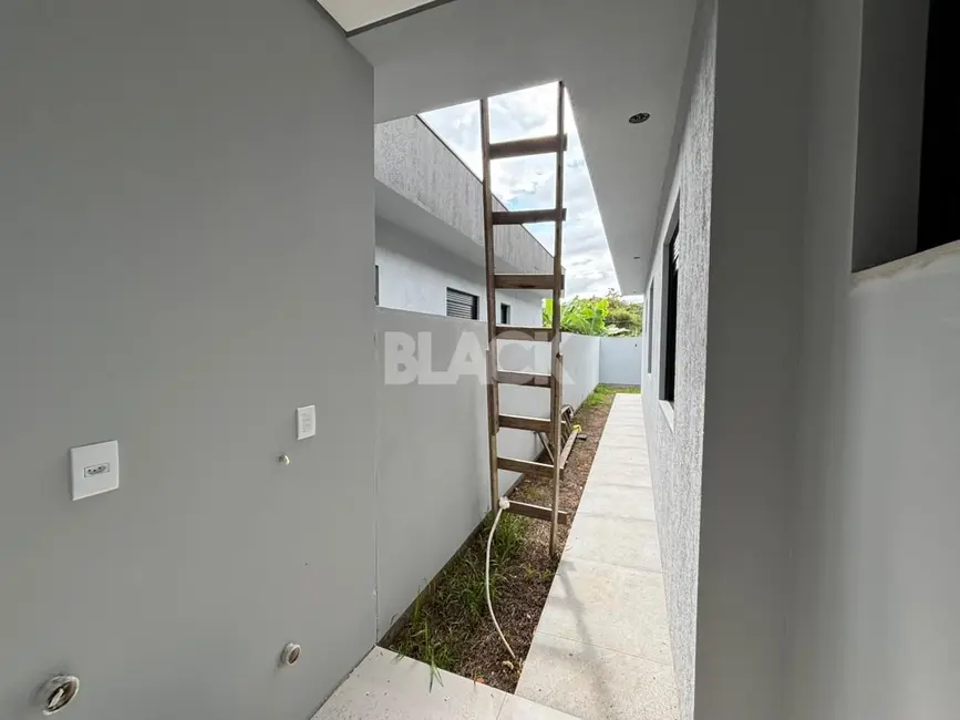 Foto 8 de Casa com 3 quartos à venda, 103m2 em Torres - RS