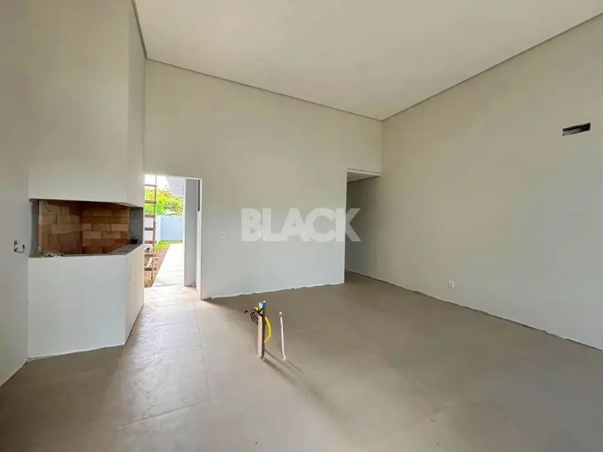 Foto 5 de Casa com 3 quartos à venda, 103m2 em Torres - RS