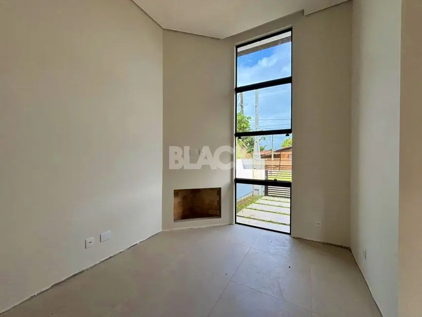 Foto 6 de Casa com 3 quartos à venda, 103m2 em Torres - RS
