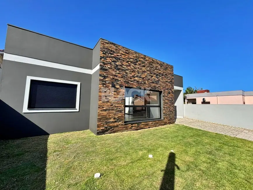 Foto 3 de Casa com 2 quartos à venda, 92m2 em Torres - RS