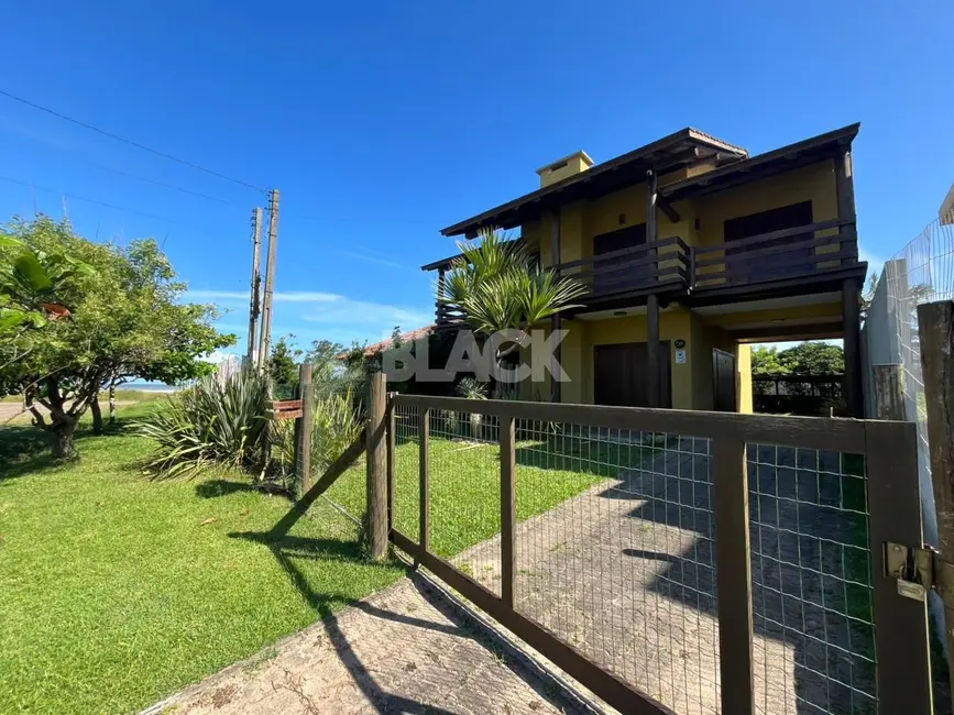 Foto 3 de Casa com 5 quartos à venda, 220m2 em Torres - RS