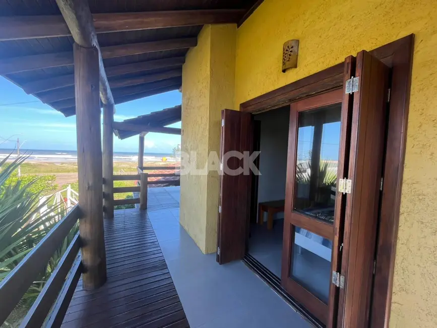 Foto 1 de Casa com 5 quartos à venda, 220m2 em Torres - RS