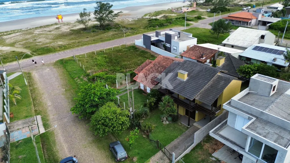 Foto 2 de Casa com 5 quartos à venda, 220m2 em Torres - RS