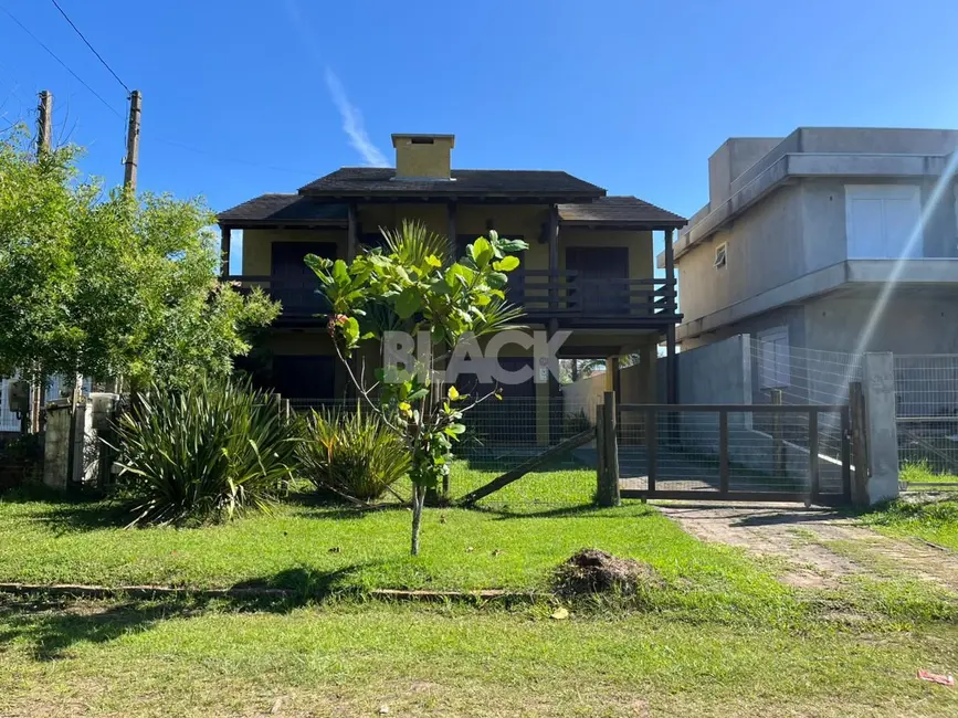 Foto 4 de Casa com 5 quartos à venda, 220m2 em Torres - RS