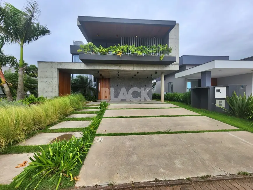 Foto 2 de Casa de Condomínio com 4 quartos à venda, 420m2 em Torres - RS