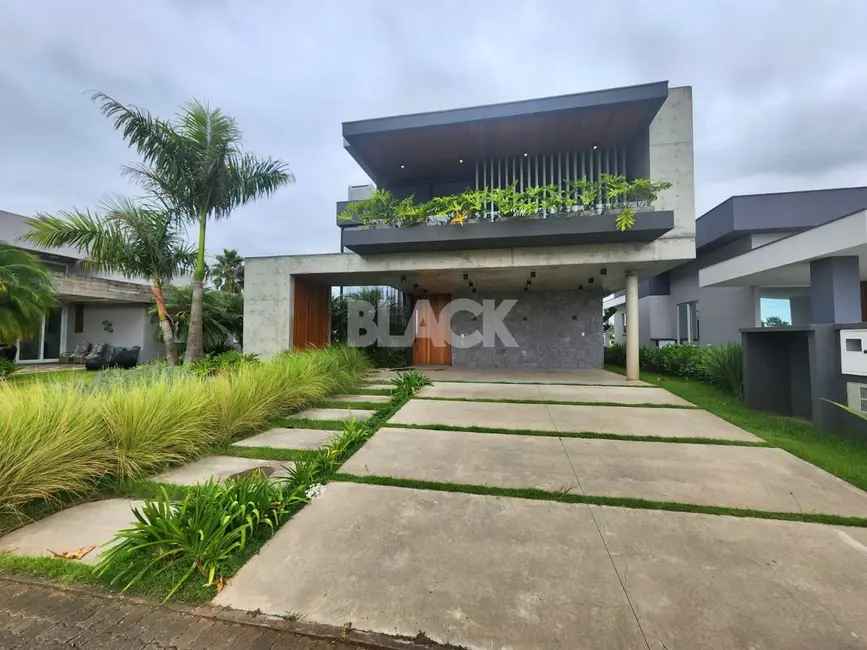 Foto 1 de Casa de Condomínio com 4 quartos à venda, 420m2 em Torres - RS