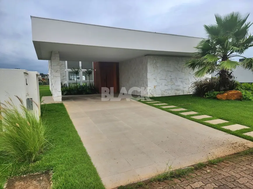 Foto 1 de Casa de Condomínio com 4 quartos à venda, 209m2 em Torres - RS