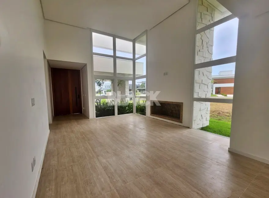 Foto 5 de Casa de Condomínio com 4 quartos à venda, 209m2 em Torres - RS