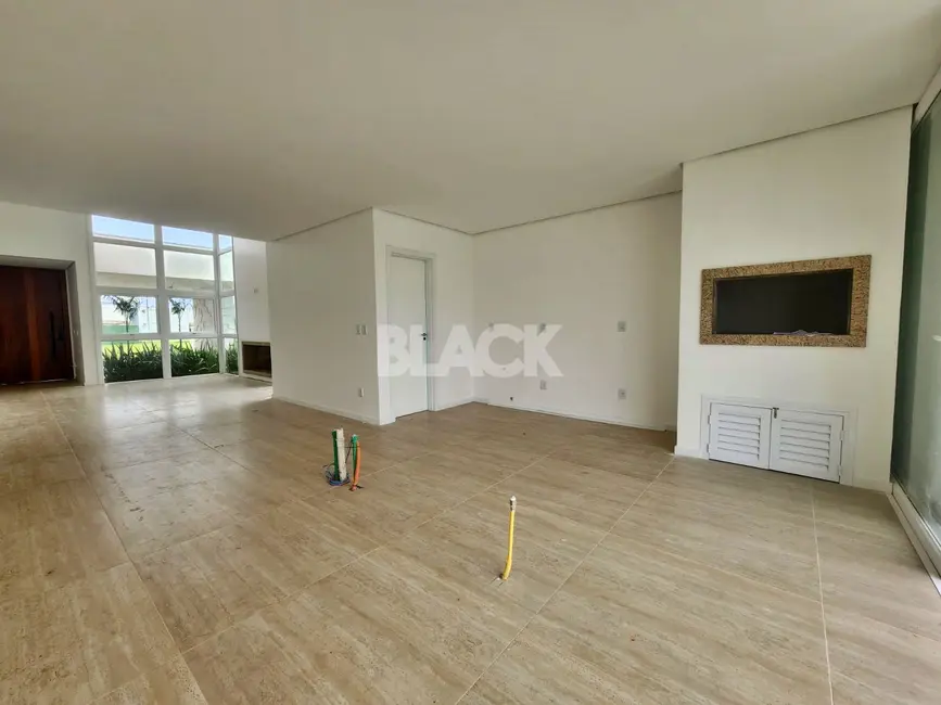 Foto 6 de Casa de Condomínio com 4 quartos à venda, 209m2 em Torres - RS