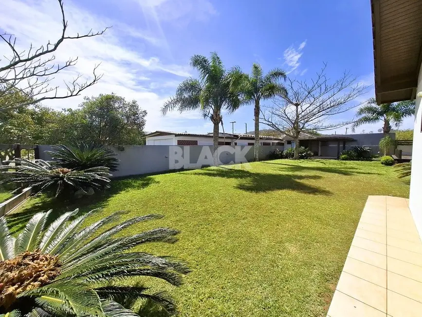 Foto 4 de Casa com 4 quartos à venda, 180m2 em Torres - RS