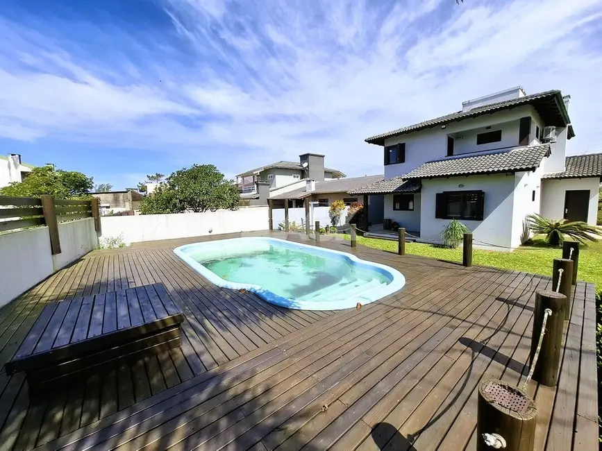 Foto 8 de Casa com 4 quartos à venda, 180m2 em Torres - RS