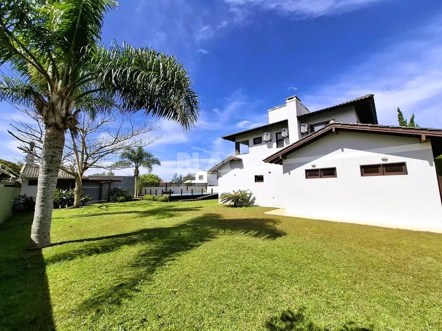 Foto 5 de Casa com 4 quartos à venda, 180m2 em Torres - RS