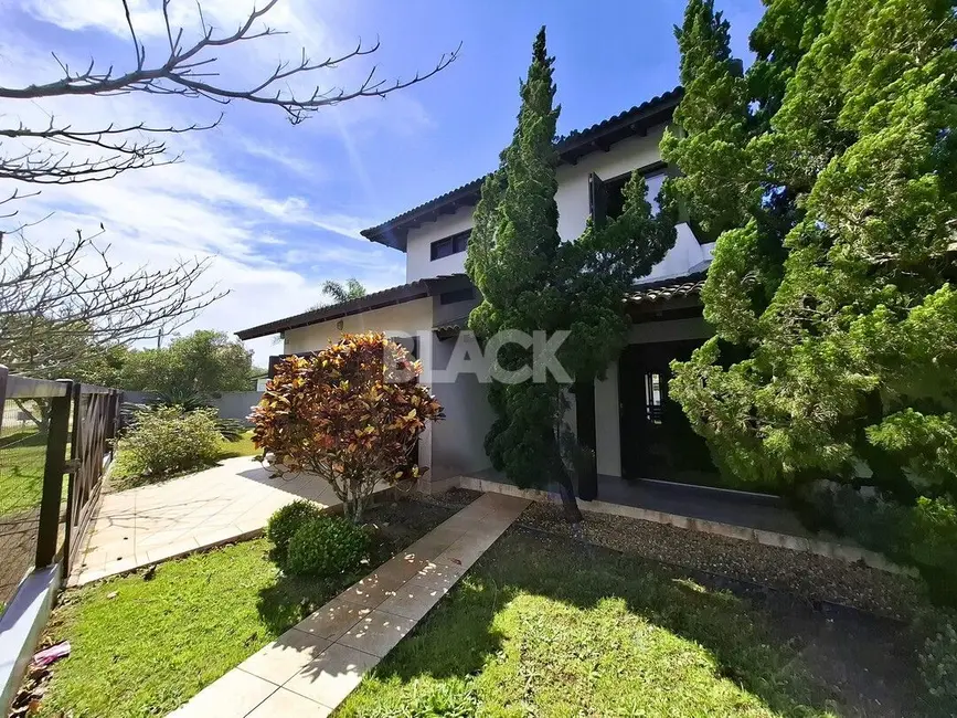 Foto 2 de Casa com 4 quartos à venda, 180m2 em Torres - RS