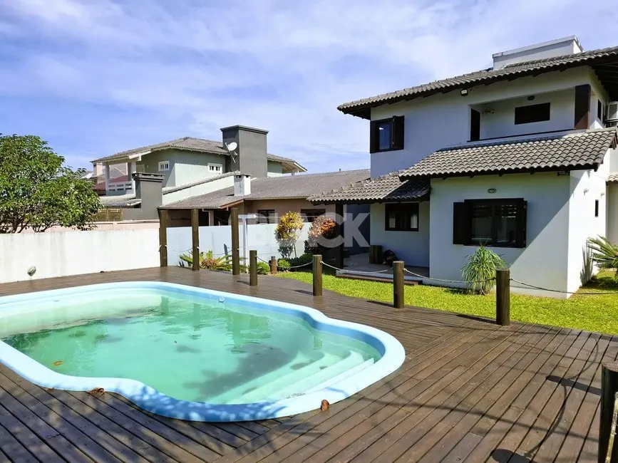 Foto 7 de Casa com 4 quartos à venda, 180m2 em Torres - RS