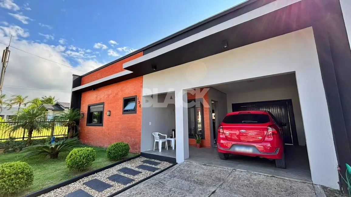 Foto 1 de Casa com 3 quartos à venda, 199m2 em Torres - RS