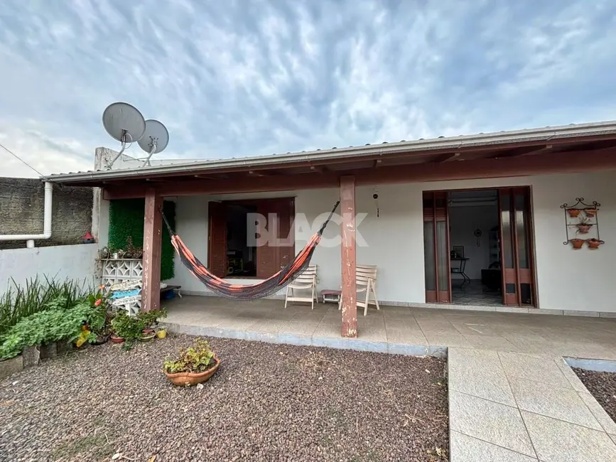 Foto 6 de Casa com 3 quartos à venda, 158m2 em Torres - RS