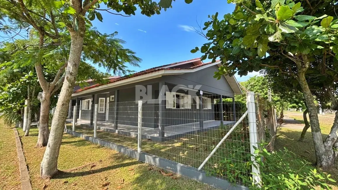 Foto 1 de Casa com 3 quartos à venda, 190m2 em Torres - RS
